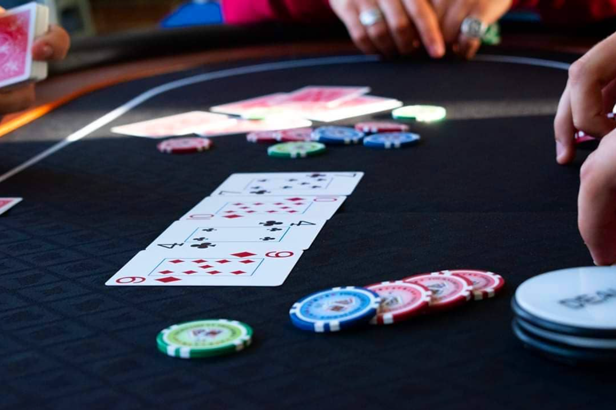 Friends running a home poker tournament